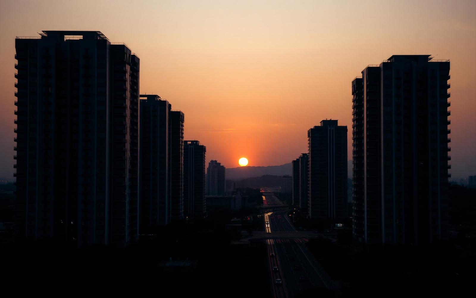 Premium modern city towers at sunrise